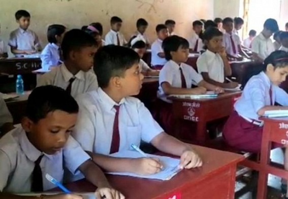 Scariest scenario caught on camera : Offline mode exam is taking in Schools without maintaining distance and masks in Tripura School 